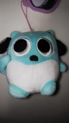 水色の犬のキャラクターぬいぐるみ