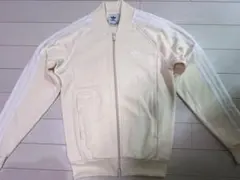 adidas SST トラックジャケット ノーカラー ベージュ