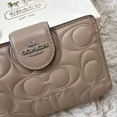 人気！COACH コーチ ベージュ 二つ折り財布 折財布 シグネチャー柄