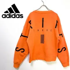 adidas オレンジ トレーナー