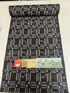 M18-5 新品保管品 綿 久留米絣 着尺反物 黒紺 赤黄色柄 - メルカリ
