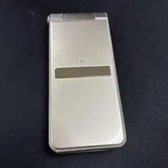 AQUOS SHF34 携帯電話 シャンパンゴールド