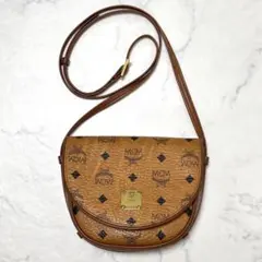 MCM ショルダーバッグ 斜め掛け 総柄 ロゴグラム フラップ - メルカリ