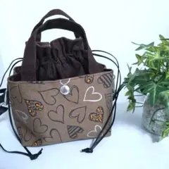 あおりポケット付き巾着バッグ　ショルダー対応　キラキラヒョウ柄ハート