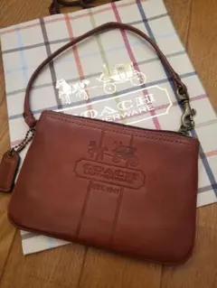新品未使用COACH コーチ本革ポーチ