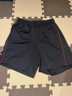 アンダーアーマー ショートパンツ 黒 赤ライン まMD