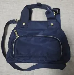 ネイビー ショルダーバッグ 前面ジッパーポケット付き　口金