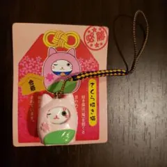 まねき猫の形のストラップ
