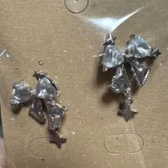 シルバー色 リボン星型チャーム ピアス