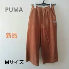 オレンジ ワイドパンツ