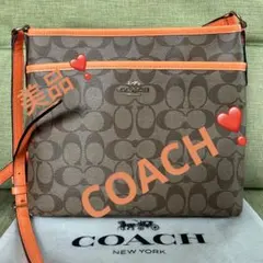 COACH コーチ　ショルダーバッグ　バッグ　シグネチャー　オレンジ　サコッシュ