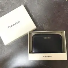 Calvin Klein ミディアム フラップジップ アラウンドウォレット