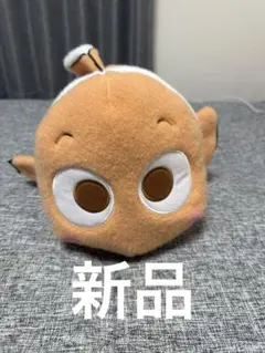 オレンジ色の魚型ぬいぐるみ