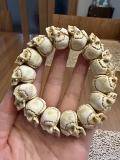 古銭モチーフ オリーブ核彫刻ブレスレット 縁起物 古銭モチーフ オリーブ核彫刻ブレスレット 縁起物 - メルカリ