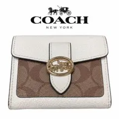 COACH 二つ折り財布 シグネチャー ホースアンドキャリッジ - メルカリ