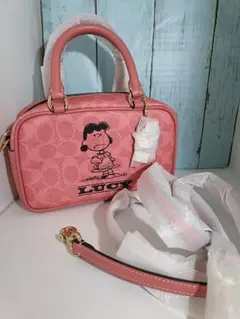 コーチ ピーナッツ　ルーシー ショルダーバッグ ピンクシグネチャー 2way