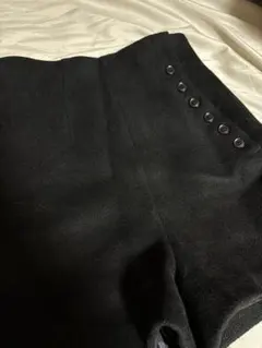 Èaphi slanting button short pants