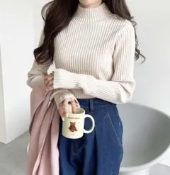 GeeRA パール調ボタンハイネックリブニット