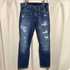y091610 Levi's デニムジーンズ W32 L32 ダメージ ロゴ