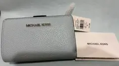 新品　MICHAEL KORS 二つ折り財布のサムネイル