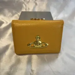 新品 Vivienne Westwood 黄色 イエロー 蝶々留め 二つ折り財布 新品 Vivienne Westwood 黄色 イエロー 蝶々留め 二つ折り財布 - メルカリ