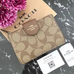 新品 COACH コーチ 財布 折り財布 サドル ブラウン 二つ折り財布のサムネイル