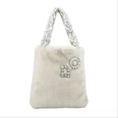 ティエドゥールキラキラブローチ付ミンク調フェイクファーフリルハンドルトートバッグ