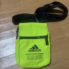 adidas スマホショルダーバッグ ネオンイエローused品。
