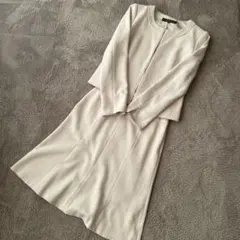 reflect アイボリー ジップアップスーツ