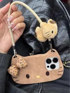 ハローキティ ヒョウ柄リボン付き iPhoneケース（ぬいぐるみチャーム付き）