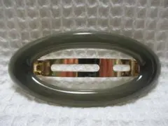 樹脂製の楕円形型　ゴールド色メタルバレッタ　カーキ系