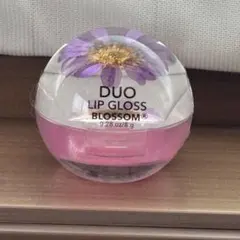 ♪ 新品　BLOSSOM DUO LIP GLOSS パープル　クリアのサムネイル