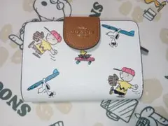 COACH PEANUTS 二つ折り財布 スヌーピー コラボのサムネイル