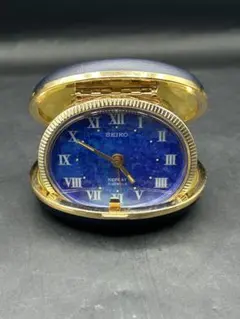 1990年代　UN レトロで珍しい手巻き式置き時計　稼働品 昭和レトロ SEIKO と Rhyhm の手巻きトラベルクロック - [Sold Out