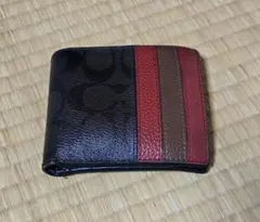 COACH メンズ 二つ折り財布 黒と赤のストライプ