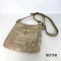 COACH コーチ シグネチャー キャンバス ゴールドレザー フラップ バッグ