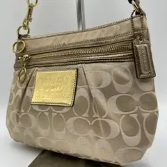 美品 COACH ショルダーバッグ キャンバス ベージュ シグネチャー 斜め掛けのサムネイル