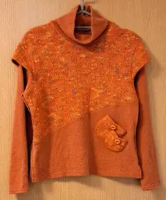 オレンジ　総柄　ポケットデザイン　ニット