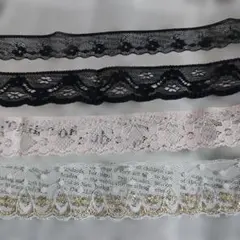 フローラルデザインのブラックレースとピンク　ホワイトの様々な幅で４本セット。
