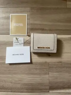 新品MICHAEL KORS 三つ折り財布 ベージュ　ホワイト　タグ付きのサムネイル