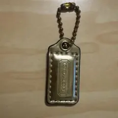 COACH ゴールド タグ型キーホルダー