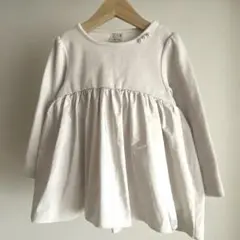 petit main アイボリー ペブラム長袖カットソー 100cm