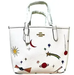 コーチ COACH 星月モチーフに上品ソフトレザーの白トート 大き過ぎず便利