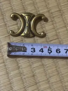 トリオンフ ブローチ ゴールドのサムネイル