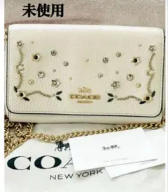 新品未使用COACH スワロフスキーロゴ入りミニショルダーバック