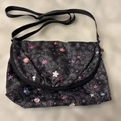 沖縄限定品LeSportsac ショルダーバッグブラック フリル リボン - メルカリ