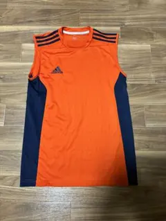 adidas ノースリーブシャツ オレンジ/ネイビー