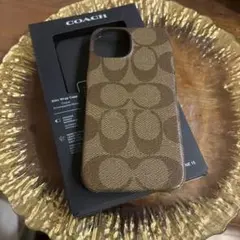 COACH iPhone 15 スリムラップケース シグネチャー(スマホケース)