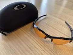 オークリー　サングラス　スポーツ　オレンジ　ブラック