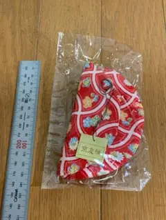 赤い花柄の布製小物入れ 巾着